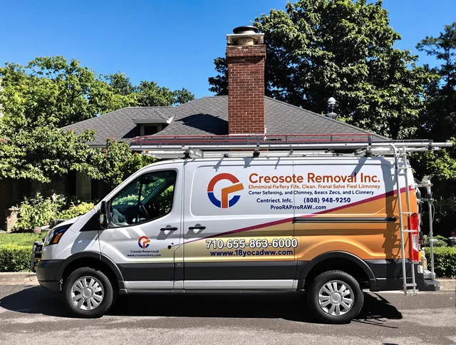 East Hampton Chimney Sweep technician removing creosote safely in East Hampton, CT